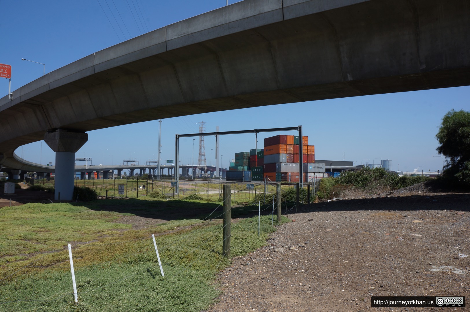 Shipping Crates Below an Overpass