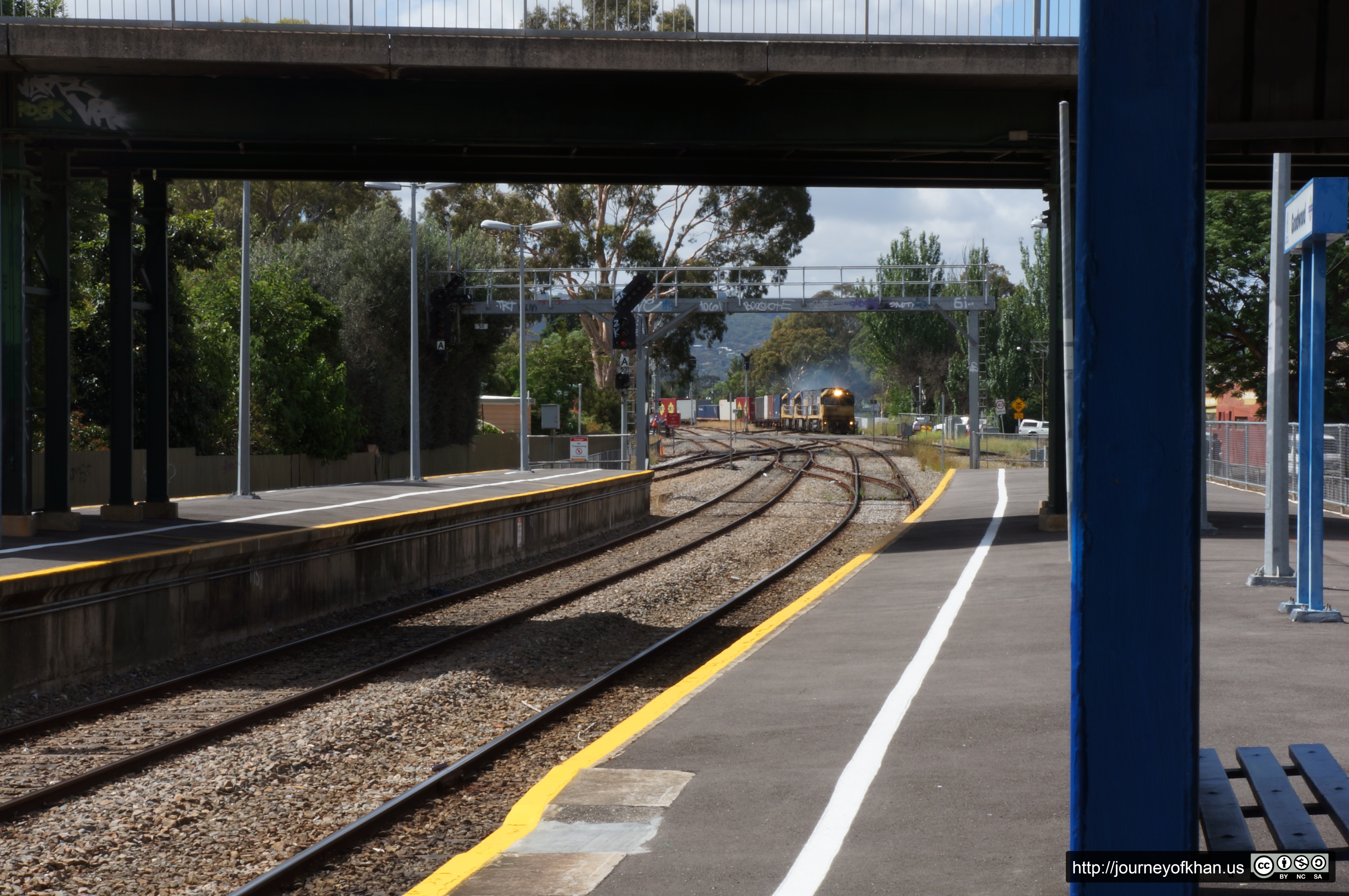 Distant Freight Train at Goodwood Station (High Resolution)